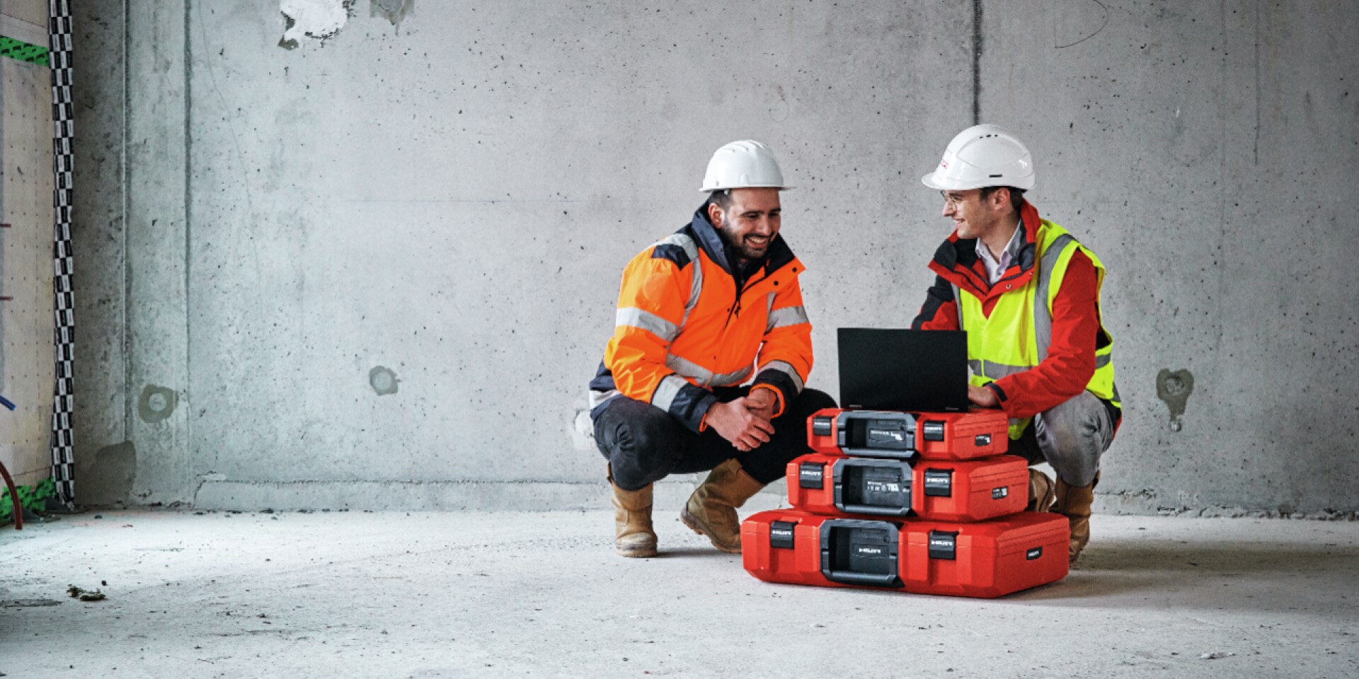 Hilti employee and customer on a jobsite